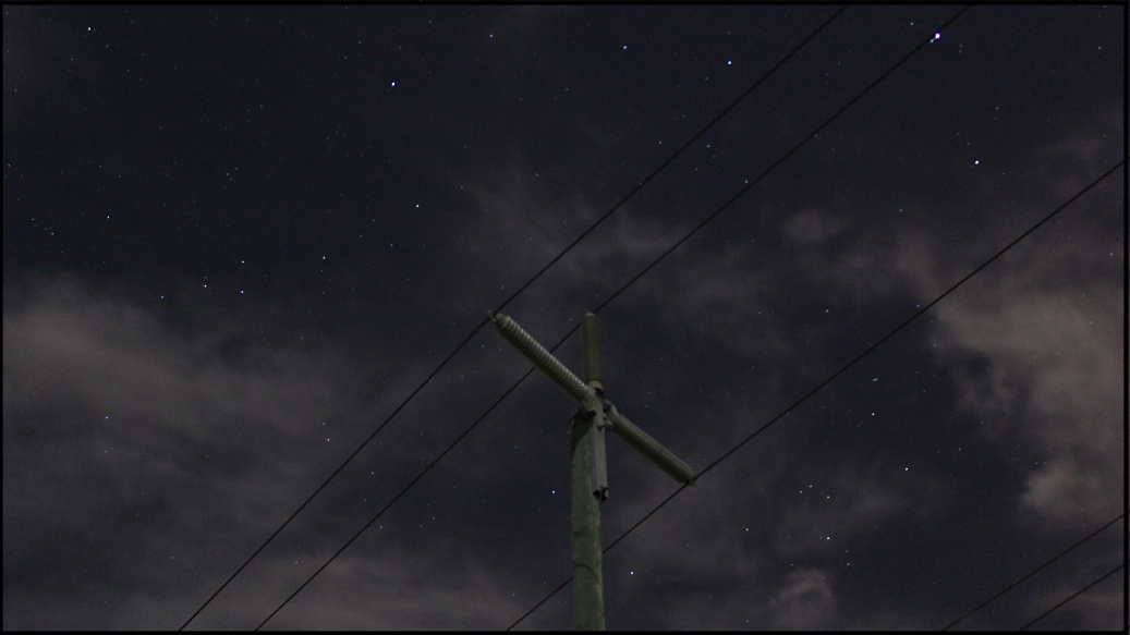 Power pole at night